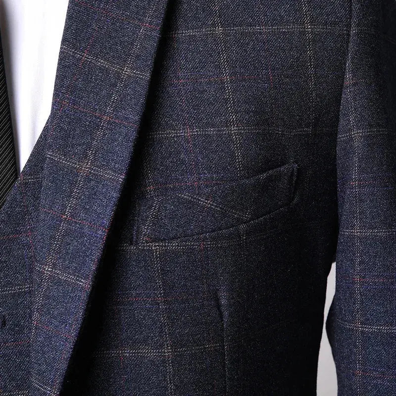 Détail de la poche de veste du costume Arthur, tenue style Peaky Blinders en tweed à carreaux.
